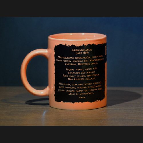 Narancs színű bögre Hunyadi könyvborító mintával